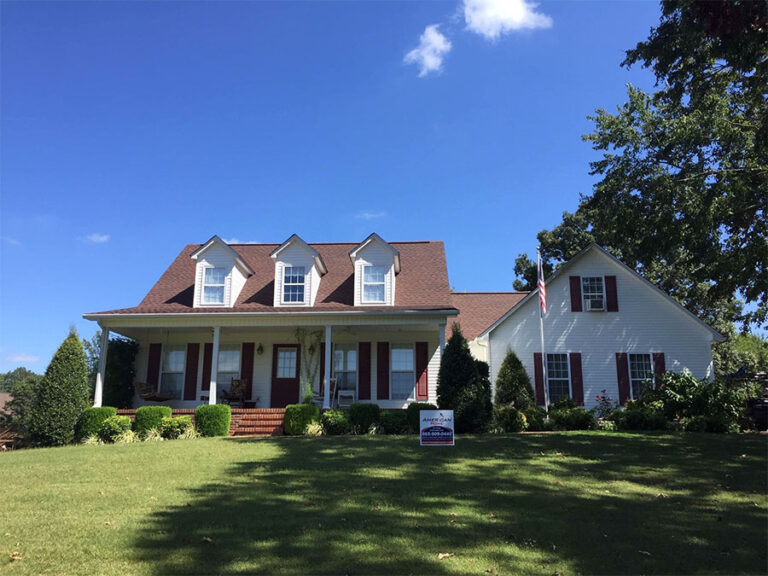Full roof replacement on a two-story home by American Home