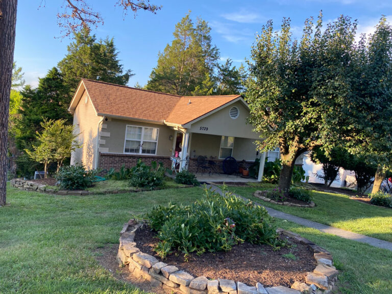 Roof replacement on a brick ranch home by American Home